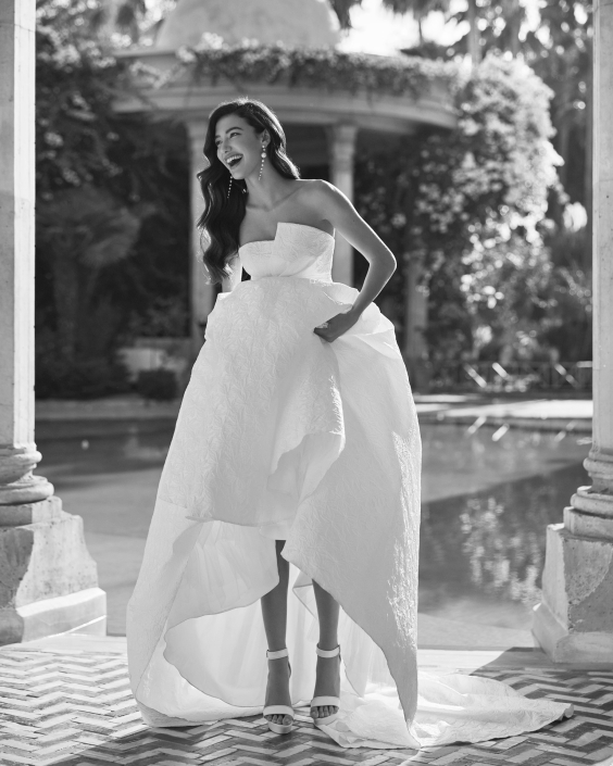 Azaly – From £1310 Azaly – From £1310 With or without puff sleeves. Available in Brocade, Satin, and Nature Brocade.