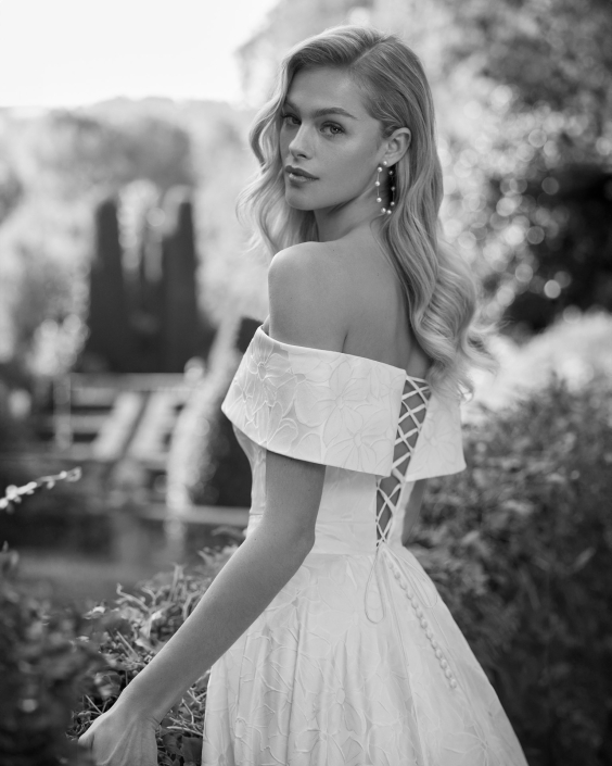 Dolmer – From £1310 Dolmer – From £1310 Zip back or corset. Available in Satin, Verona Mikado, and Brocade.