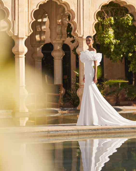 Odon £1,850 Rosa Clara Odon wedding dress which has a removable ruffle. Available at The Little Bridal Boutique