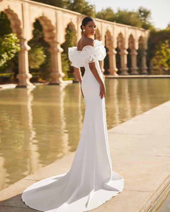 Odon £1,850 Rosa Clara Odon wedding dress which has a removable ruffle. Available at The Little Bridal Boutique