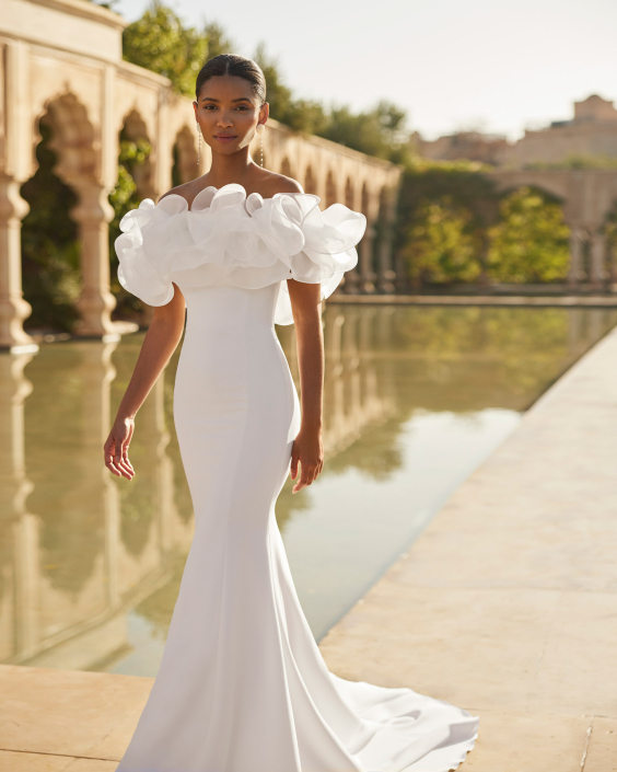 Odon £1,850 Rosa Clara Odon wedding dress which has a removable ruffle. Available at The Little Bridal Boutique