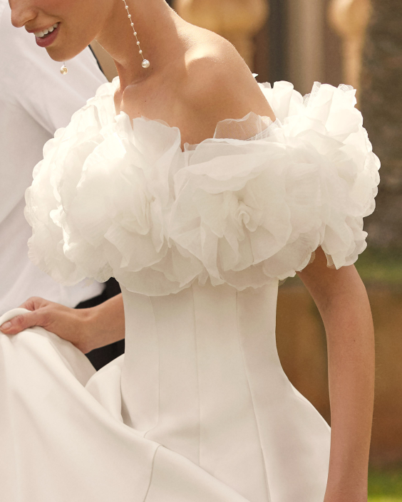 Removable ruffle £450 Rosa Clara ruffle to go with any strapless dress, available at The Little Bridal Boutique