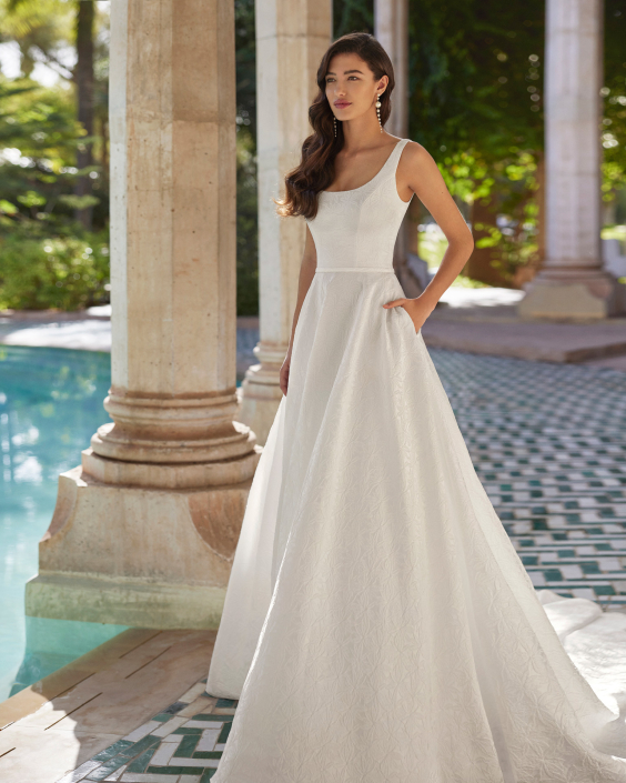 Azara by Adriana Alier at The Little Bridal Boutique. Available in satin, brocade or mikado.
