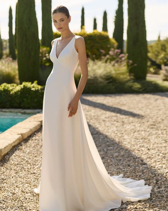 Melani (dress only £1,290) with coat £1,760 Melani by Alma Novia at The Little Bridal Boutique
