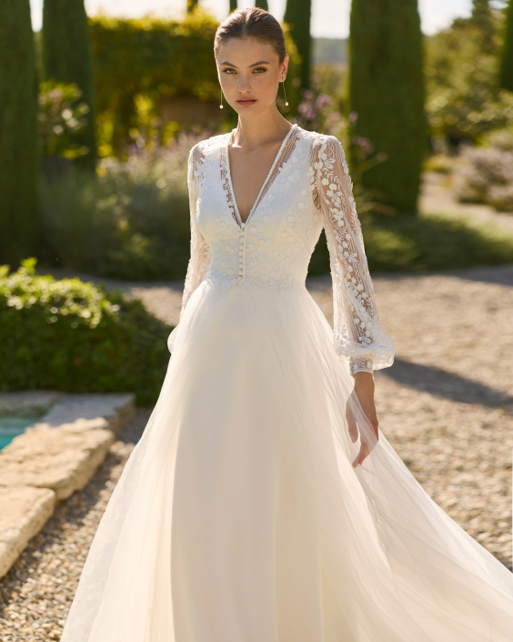 Melani (dress only £1,290) with coat £1,760 Melani by Alma Novia at The Little Bridal Boutique