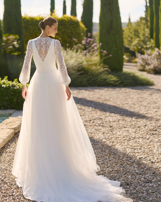 Melani (dress only £1,290) with coat £1,760 Melani by Alma Novia at The Little Bridal Boutique